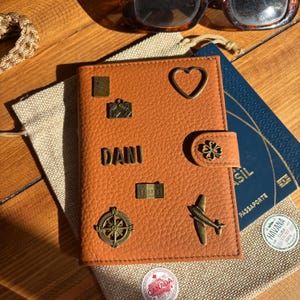 Personalised RFID Blocking Snap Closure Genuine Leather Passport Wallet with 7 Charms and Name: Custom Travel Accessory