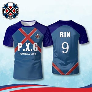 May include: A blue and navy football jersey with the text "P.X.G FOOTBALL CLUB" on the front. The jersey has a red cross design and the number 9 on the back. The jersey also has the text "RIN" on the back.