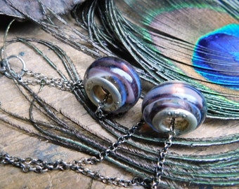 Wild Orchid Earrings. Large hole purple glass swirl beads & Oxidized sterling silver dangle trapeze earrings.  #FestiveEtsyFinds