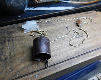 The Harbinger of Darkness Gothic Necklace. Rust Colored Old bell, Rough crystal quartz, snake bone, and dragon's vein agate unisex talisman