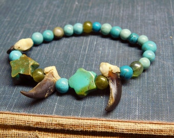 Nocturnal Desert. Genuine Blue & Green Turquoise, Genuine Coyote Claws, and glass beaded stretchy bracelet  #FestiveEtsyFinds