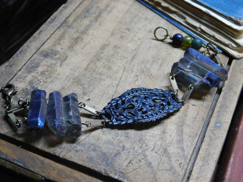 The Hela Bracelet. ROugh Raw Cobalt Blue titanium coated quartz , Gothic Black filigree center, and Glass beads one of a kind bracelet cuff image 3