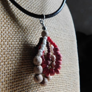Firefly. Nut, Wood, & Glass wing like boho pendant and leather cord necklace  #FestiveEtsyFinds