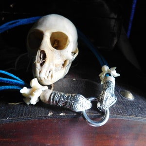 The Snake Charmer. Genuine snake python bones. turquoise leather suede cord necklace, and double headed snake clasp  #FestiveEtsyFinds
