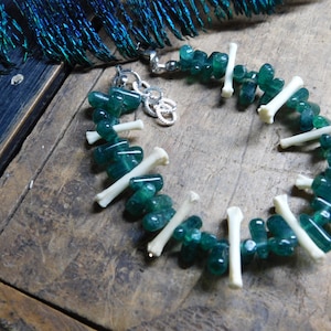 Buried Beneath the Pines. Bracelet. Dark Pine Green Avenutrine & Genuine Coyote (Brush Wolf) Bones.  #FestiveEtsyFinds