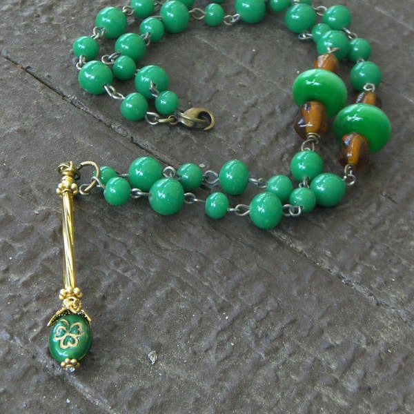 Spring  clearance destash sale- The Irish Whiskey Tavern. Kelly green glass and shamrock magick wand necklace.