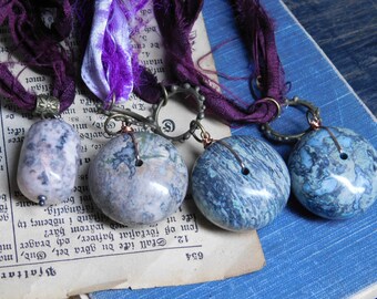 The Galaxy Sisters. Choice of Turquoise on Merlot Red, Orchid on Violet, or Pink Rhodonite on Merlot Red Pendants on Vintage Sari Silk