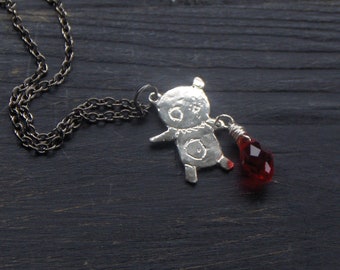 WRATHCHILD.  Zombie Teddy Bear Cast in sterling silver with red crystal blood drop. Handmade made to order design by Chymiera on ETSY