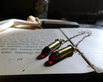 From a Long Line Of Sinners. Upcycled brass 22 bullets & red crystal long dangle earrings.  #FestiveEtsyFinds