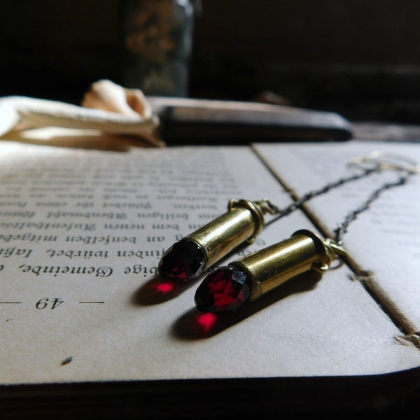 From a Long Line Of Sinners. Upcycled brass 22 bullets & red crystal long dangle earrings.  #FestiveEtsyFinds