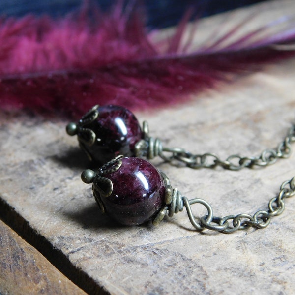 The Red Grapes Decadent Shoulder Sweeper Earrings. Genuine Garnet ( January's birthstone ) Spheres & antiqued brass leafy caps long dangles