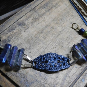 The Hela Bracelet. ROugh Raw Cobalt Blue titanium coated quartz , Gothic Black filigree center, and Glass beads one of a kind bracelet cuff image 2