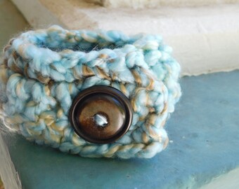 The Riverbank Boho Crochet Cuff Bracelet with real wooden button. Turquoise Boucle Yarn . Wristlet. Bracelet. Button .  #FestiveEtsyFinds