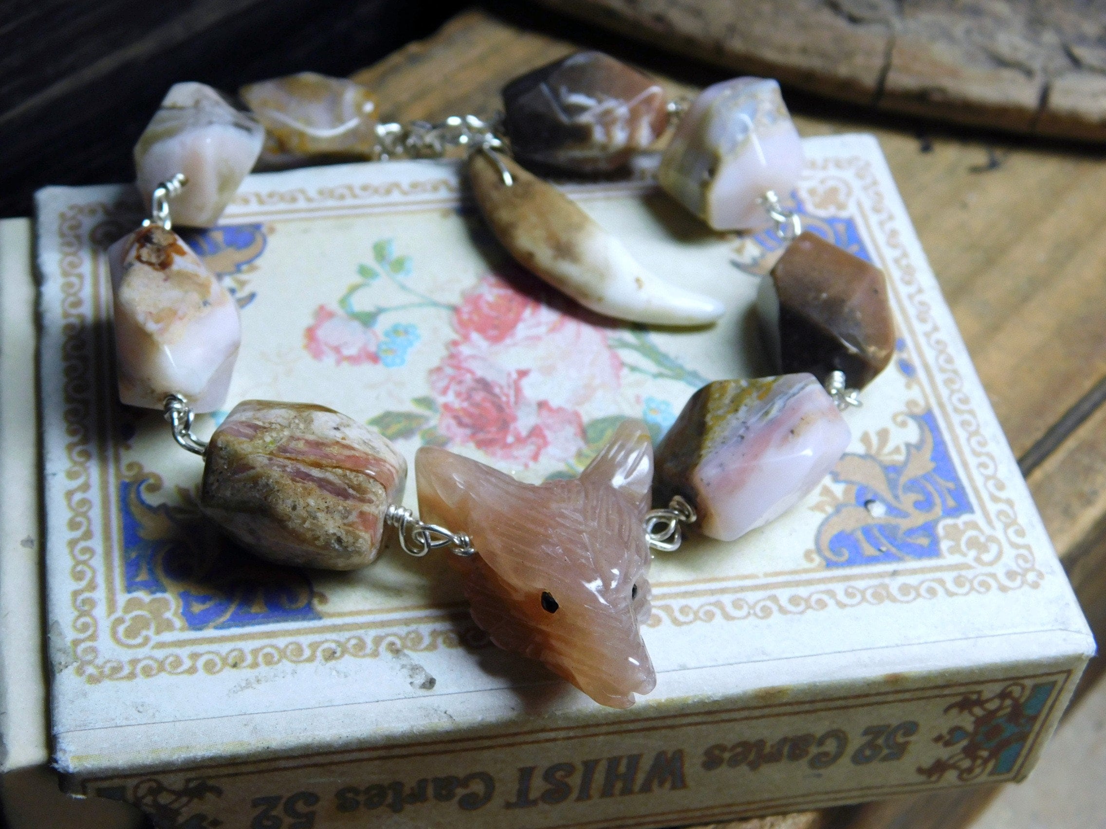 Lupin. She-wolf Bracelet. Carved Peach Sunstone Wolf Head, Genuine