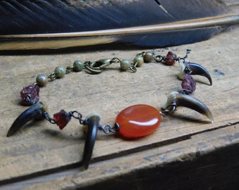 Periapt of The Red Wolf Moon. Rough Raw Genuine Garnet, Orange Carnelian, Amazonite, and genuine coyote claws bracelet  #FestiveEtsyFinds