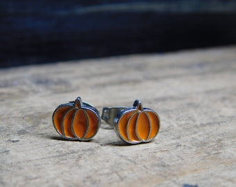 Tiny Pumpkin Post earrings.  Enameled metal pumpkins on surgical steel ear studs. Cute Halloween, fall, autumn everyday Kid adult earrings
