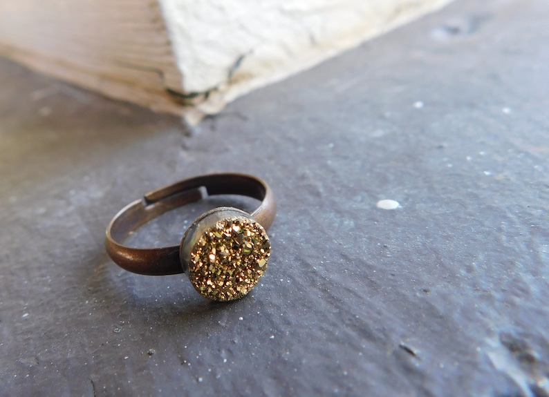 The Gilded Druzy Ring Gold Druzy Titanium Coated Crystal Cabochon ring.