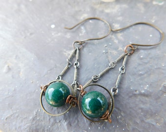 The Saturn Earrings. Halo'd Green Goldstone spheres Trapeze style earrings.  #FestiveEtsyFinds