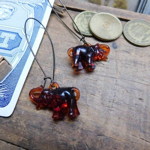 Two by Two. Vintage Celluloid dark whiskey colored Circus Elephant charms upcyled earrings. Gumball Machine Cracker Jack Box Surprise