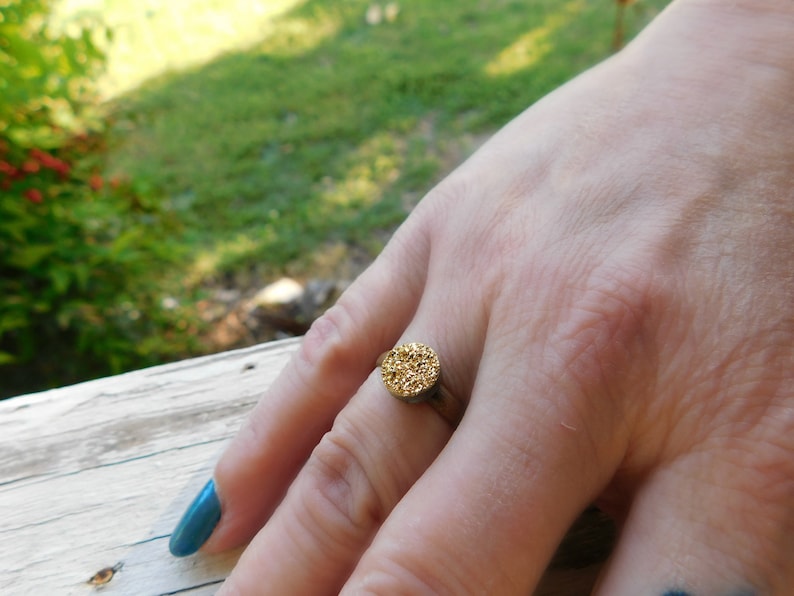 The Gilded Druzy Ring Gold Druzy Titanium Coated Crystal Cabochon ring.