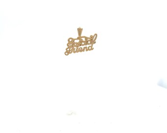 May include: A gold-colored pendant in the shape of the words "Special Friend" in a cursive font. The pendant has a small loop at the top for a chain. The background is plain white.