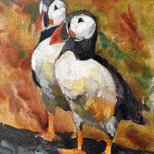 Two Puffins on the Edge, Oil painting of two puffins standing close together on a rocky cliff. A small, textured canvas full of warmth