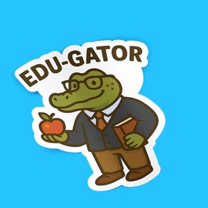 May include: A sticker featuring a cartoon alligator wearing glasses, a suit, and holding an apple and a book. The text "EDU-GATOR" is above the alligator. The sticker is on a blue background.