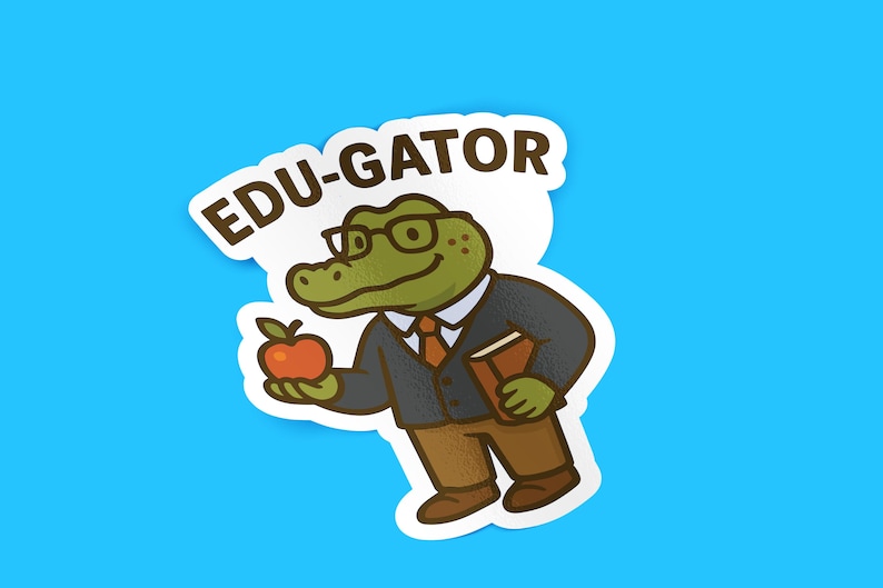 May include: A sticker featuring a cartoon alligator wearing glasses, a suit, and holding an apple and a book. The text "EDU-GATOR" is above the alligator. The sticker is on a blue background.