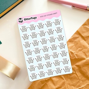 Könnte beinhalten: Ein Bogen kissgeschnittener Aufkleber mit Cartoon-Felsen mit Armen und dem Text "You Rock!". Die Aufkleber sind grau mit schwarzen Umrissen und befinden sich auf einem hellblauen Hintergrund. Das Blatt ist mit "OtterTags" beschriftet.