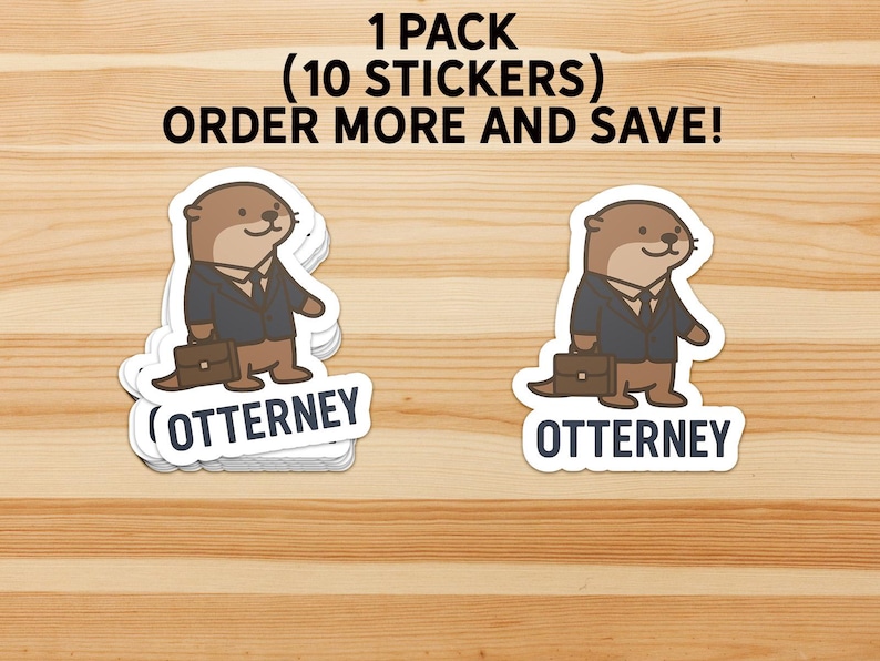 K&ouml;nnte beinhalten: Aufkleber-Packung mit einem Cartoon-Otter im Anzug, der eine Aktentasche h&auml;lt, mit dem Wort "Otterney" darunter. Die Aufkleber sind wei&szlig; mit einem braunen Otter-Design. Der Text oben lautet "1 PACK (10 STICKERS) ORDER MORE AND SAVE!"