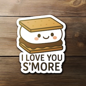May include: A sticker featuring a cute s'more with a smiling face. The s'more is composed of a marshmallow, chocolate, and graham crackers. The text "I LOVE YOU S'MORE" is below the s'more.
