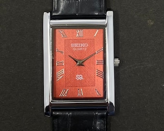 Reloj Seiko Vintage Slim con esfera roja para hombre