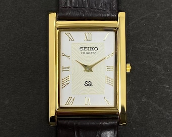 VIT URTAVLA Vintage Slim Seiko herrklockor med nytt mörkbrunt armband