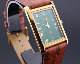 ヴィンテージ セイコー スリム クォーツ メンズ腕時計 - 送料無料