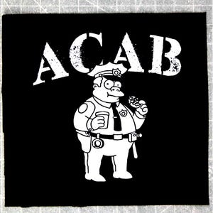 May include: Black and white patch with the acronym "ACAB" in large, bold letters. A cartoon police officer with a donut in his hand is depicted below the text.