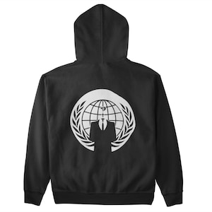 May include: Black hooded sweatshirt with a white graphic on the back. The graphic features a globe, laurel wreath, and a stylized figure in a suit, representing the Anonymous symbol. The hoodie has a drawstring and a front pocket.