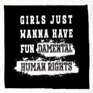May include: Black and white graphic text on a black background. The text reads "Girls just wanna have fun damental human rights".