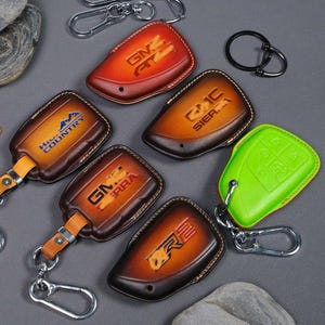 Leather Key Fob Cover Compatible with GMC Sierra , siera EV,  AT4 Denali Chevy Silverado ZR2 High Country 2014–2025 Smart Remote Case Gift