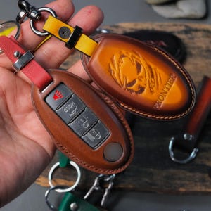 Leather Key Fob Cover for Nissan Rogue, Altima, Sentra, Pathfinder, Armada (2007–2025) – 55+ Colors, Custom Logo, Personalized Key Case Gift