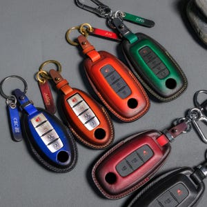 Nissan Rogue Custom Leather Key Fob Cover – Compatible with Ariya, Altima, Leaf , Pathfinder,Frontier | Personalized Remote Case Protector