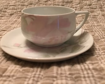 Delicate Teacup and Saucer