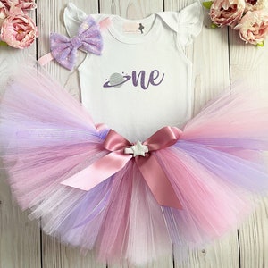 The perfect Space One Girly birthday outfit for your little princess! Can be made to match a birthday party theme! This listing includes choice of 1 handmade Tutu on stretch elastic, 1 bodysuit and 1 hair bow on a elastic headband.