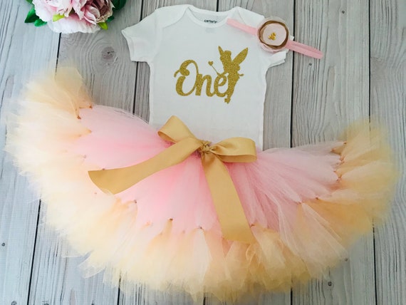 pink and gold baby outfit