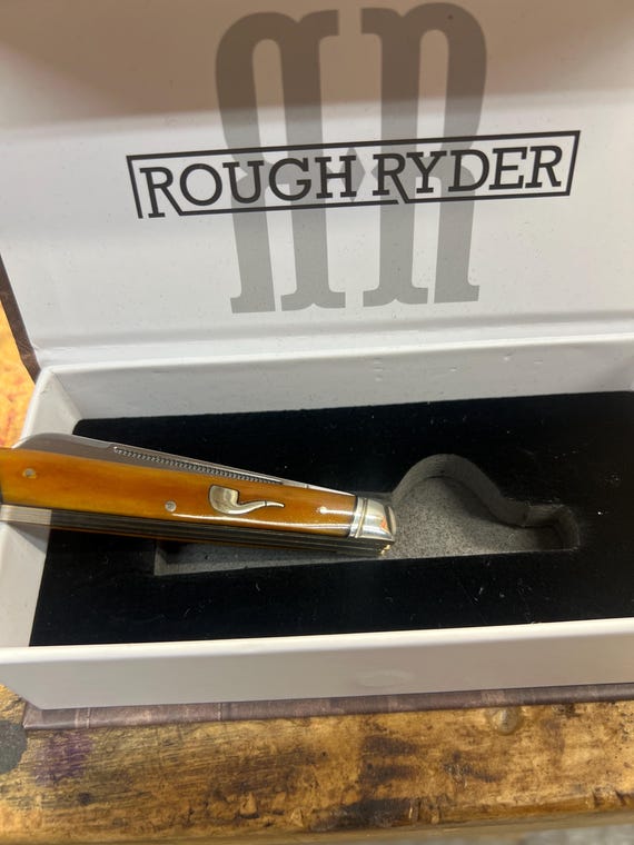 pipe tamper/knife