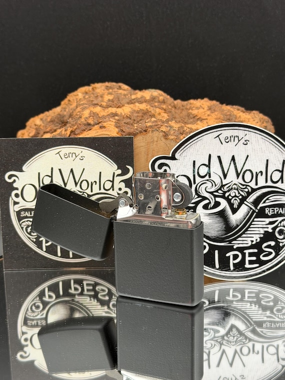 Zippo standard wind proof lighter.