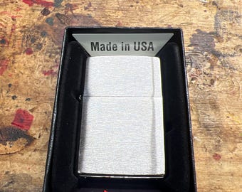 Zippo standard wind proof lighter.
