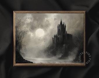 May include: A framed print of a gothic castle at night. The artwork depicts a dark castle on a misty shoreline, with a full moon in the background. The print is in a wooden frame and has the text "VERITAS FINE PRINTS".