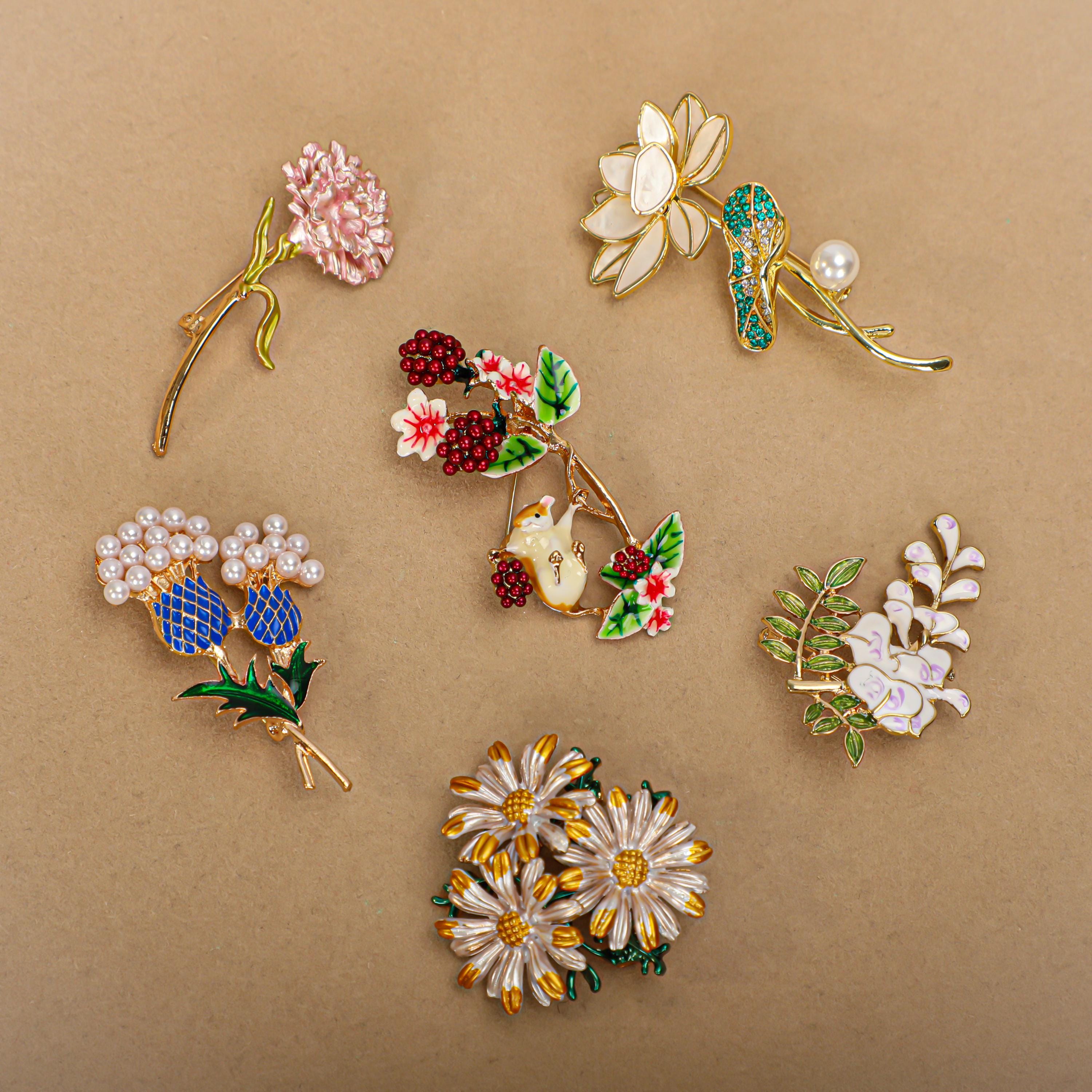 ブローチ ✩*॰本物のお花を✩*॰ ストーンつき 蘭の花のブローチ - Etsy 日本