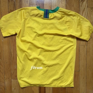 May include: A set of three ceramic mugs with a speckled, matte finish. The mugs are in shades of cream, light gray, and dark gray. Each mug has a simple, minimalist design, perfect for coffee or tea.