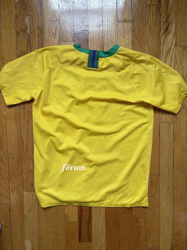 May include: A set of three ceramic mugs with a speckled, matte finish. The mugs are in shades of cream, light gray, and dark gray. Each mug has a simple, minimalist design, perfect for coffee or tea.